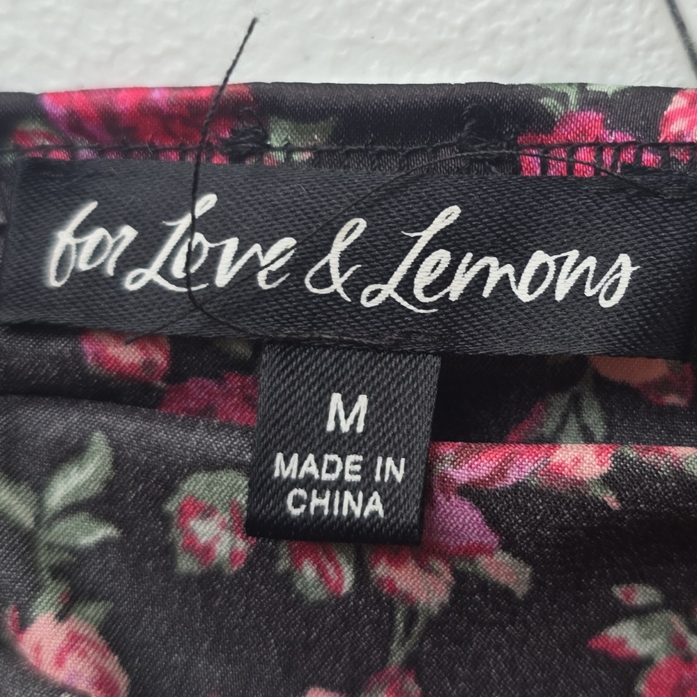For Love & Lemons Black Off-Shoulder Ruched Mini Dress with Floral Print - Picture 12 of 15